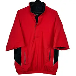 100% Polyester w/ Polyurethane laminate. Short Sleeve Rain Jacket. 2 Zip Front pockets. 1/2 Zip Pullover. Colors: Red +...
