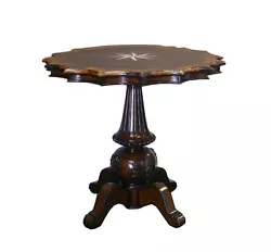 $This is a nicely handmade pedestial table in star shape with center marble stone star pattern and shell inlay around...