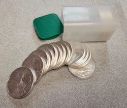 You will receive 20 Spotless coins in a tube exactly as you see in the photos.