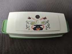 This vintage butter dish is a stylish addition to any kitchen. It is made of durable plastic material, and comes in a...