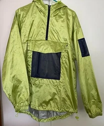 Jacket has 1/4 Zip Drawstring Hoodie. with light lining. Lining / Hood: 100% Polyester. Shell: 100% Nylon. Large center...