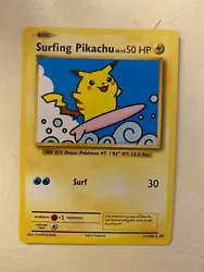 Surfing Pikachu Pokémon card in Very good condition. Condition is 
