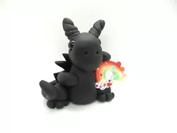 This black dragon shows off his colorful rainbow. They are made for mature children to adults. They are semi fragile...