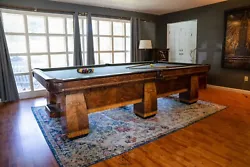 Each table was handcrafted in Illinois. This table was family owned and spent most of its life in an estate in New...