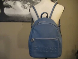 GUESS logo on front zip pocket. (H)12