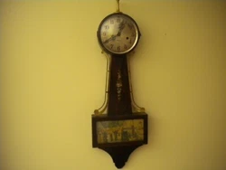 cool easy to use banjo clock   easy quartz movement        has secret cabnet  to hide things    has different...