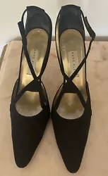 Anne Klein size 9.5 black heels. These heels criss-cross on the top and have side regular closure. I best describe the...