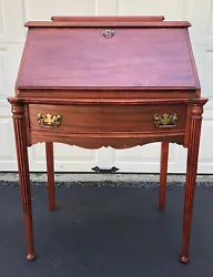 This antique desk is in used condition, but its charm and functionality remain intact. It is available for pick up in...