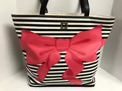 KATE SPADE New York Vinyl Tote with Pink Bow Large, double handles with 10” drop, inside has pink signature lining,...
