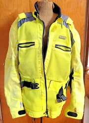 Includes elbow and shoulder armor. Back padding as well. Great jacket if you have a bike.