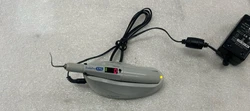 Includes Dental Obturation System w/ Charging base and AC Adapter.