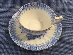 Beautiful delicate blue and white design, see photos, gold rim on both teacup and saucer as well as the handle of the...