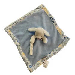 Blankets & Beyond blue with a white puppy face, long earsWhite, blue and yellow trimmingNew with half a tag attached15