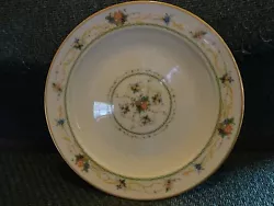Normandy 8162 W83. No crazing in the glaze, and the glaze is nice and shiny. Bread Plate. The gold trim has no wear. No...
