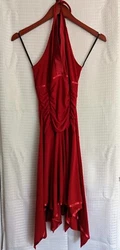 This is a Very cute and pretty deep Ruby red halter dress made by taboo. I cannot find a size on the dress but I would...