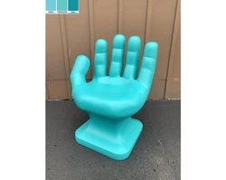 For sale is a NEW GIANT left Hand Shaped Chair. It is solid AQUA in color. The plastic is solid colored all the way...
