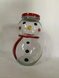 This Winter Sweets Clear Glass Snowman Cookie Candy Jar Canister with Red Metal Lid is a perfect addition to your...