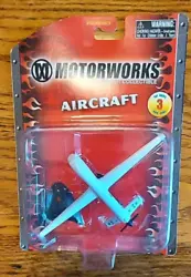 Motorworks RQ-1 Predator Drone Diecast metal with stand by Maisto. Hanger card is bent at the bottom right front corner...