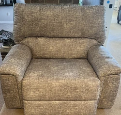 Recline and enjoy peaceful comfort with the Zeke power recliner. It features infinite reclining positions so you can...