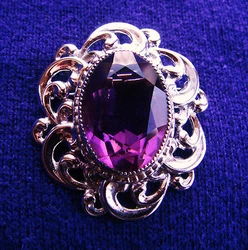 The purple stone is about 1