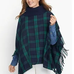 A stylish fringed poncho in our signature Black Watch plaid. Ribknit cowl neck. Time to cozy up.35% Polyester, 25%...