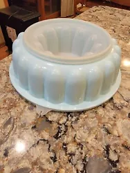 Vintage Tupperware Jello Mold Ice Ring Light Mint Blue/Green Large 3 Piece #1202. Good used condition. Seals properly...