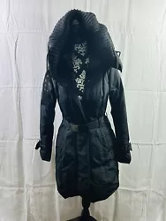 This jacket is in over all really nice condition. There are no rips. There are a couple marks on the inside liner that...
