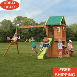 2 belt swings and trapeze bar. Down below there is another fort, with front wall, window, and real door! And the side...
