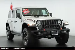 This 2019 Jeep Wrangler Unlimited Rubicon is a certified preowned vehicle with the bright white clear coat exterior and...