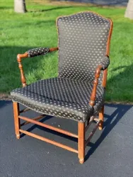 Antique Upholstered Walnut Arm Chair with a curved back and turned arms. The newer upholstery was very well done in...