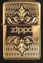 Zippo item # 51155. Zippo Windproof Lighter with Engraved Regal Design and Zippo Logo. Finish: High Polished Brass.