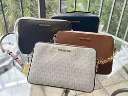 This east west crossbody bag features; Black, Vanilla, Powder Blush and Many More. CROSSBODY BAG. STYLE: EW CROSSBODY....