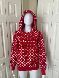 Iconic red louis vuitton supreme hoodie size small. Sought after collaboration. In excellent shape and probably only...
