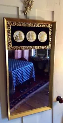 Hollywood Regency neoclassical style wall or console mirror. Maker: B & S Creations. Mid 20th Century. H x 16-3/8 in. W...