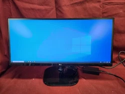 A few scratches in the lower left and upper center (see pics). Neck of stand is a little wobbly. It sits fine, but is...