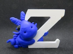 This dragon is a pretty shade of blue beside the white letter Z. They are made for mature children to adults. They are...