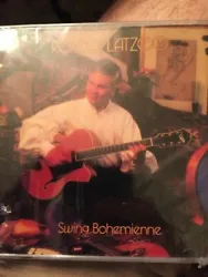 Artist : Roger Latzgo. Swing Bohemienne. Title : Swing Bohemienne. Label : CD Baby. Product Category : Music. Binding :...