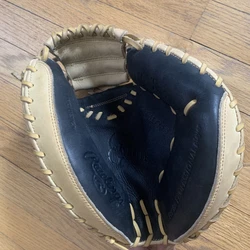 Rawlings Gold Glove Elite CGECM325B. Excellent condition, very light use. The leather is stiff but supple with plenty...