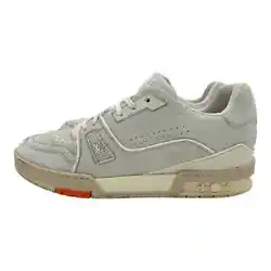 These stylish sneakers are crafted of white leather. The tongue displays the LV logo as well as the heel of the shoe...