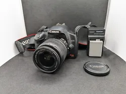 Canon 18-55mm Lens with lens cap. - The only notable issue is that the screen has a line through it, which you can see...