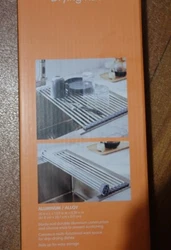This is a multi-purpose rolling up dish rack from Squared Away. Perf ect size 20.4