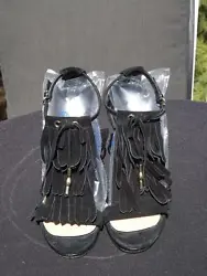 For sale is a pair of Gucci Becky Gladiator Shoes. These nice size 6 B shoes feature a fringed vamp with silver...