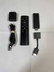 Amazon Fire Stick L-2338 Model LY73PR with Remote and Charger complete. Condition is Used. Shipped with USPS Ground...