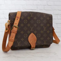 Includes: Authentic Louis Vuitton Purse only. Adjustable long crossbody flat leather strap. Monogram coated canvas. The...