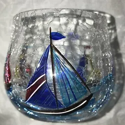 Handpainted sailboats adorn the multicolor glass, which is cracked for a unique look.