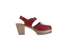 Contrast topstitching outlines a clog-inspired, platform sandal set on a chunky, lugged wooden heel. 3 heel; 1 1/4...
