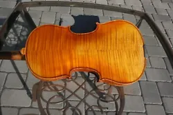 This is a beautiful full size violin made in Germany.