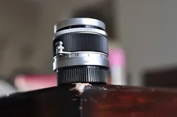Canon Serena 50mm F1.8  M39 Screw Mount Lens with caps . Optics are decent with light dust specs and I can see some...
