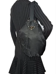 This PRADA drawstring style bag overall condition looks good inside and out. Therefore, if you are looking for a new or...