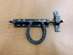 Horseshoe Gate/Barn Door Latch made from a horseshoe and hot rolled steel.
